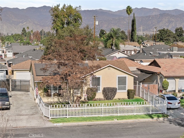 view of front of home featuring a mountain view