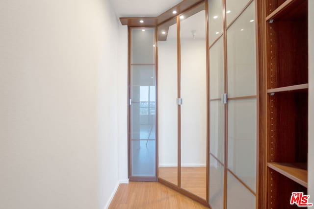 hall featuring light wood-type flooring