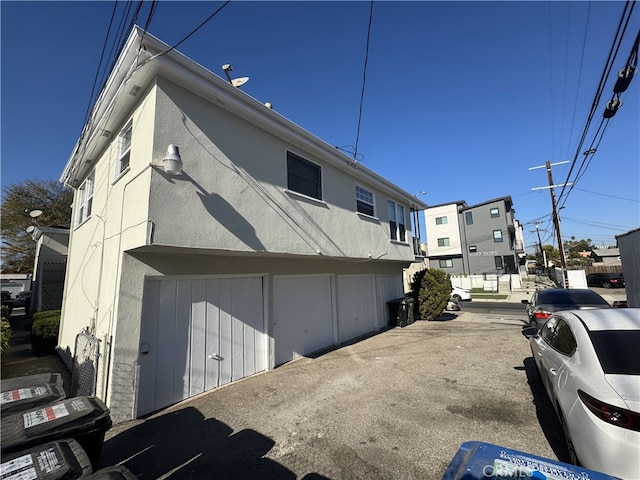 exterior space with a garage