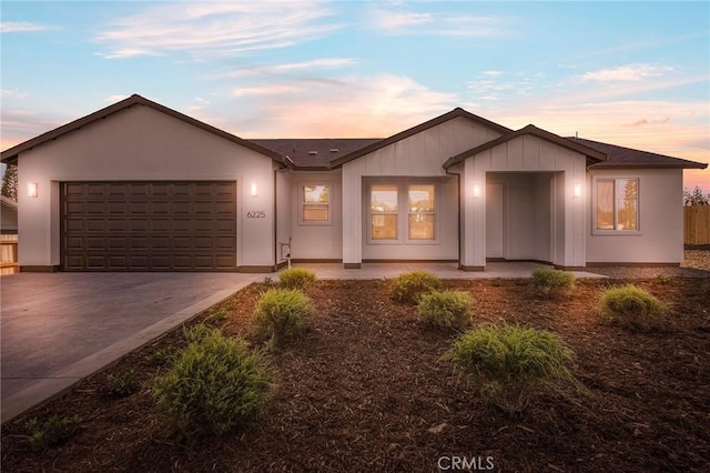 single story home featuring a garage