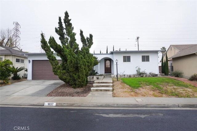 ranch-style house with a garage