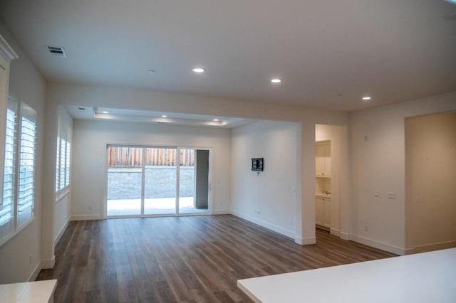 interior space with dark hardwood / wood-style floors