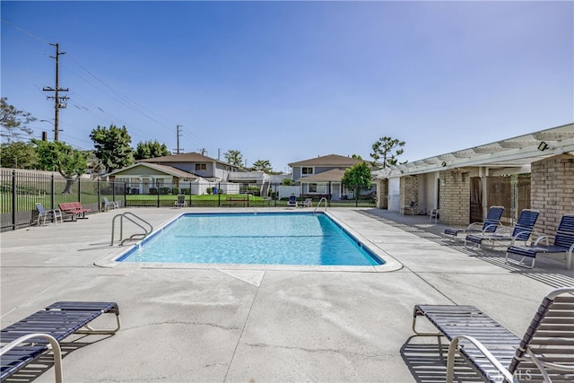 view of pool featuring a patio area