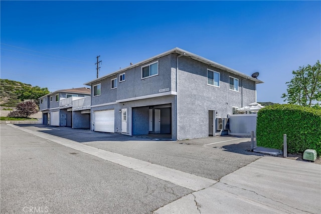 exterior space with a garage