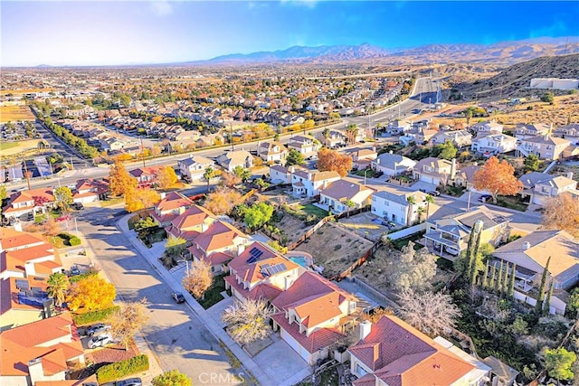 birds eye view of property featuring a mountain view