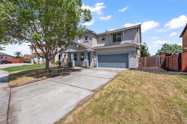 view of front facade with a garage and a front lawn