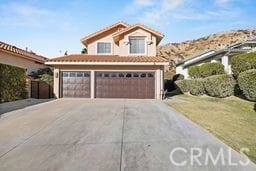 view of property featuring a garage