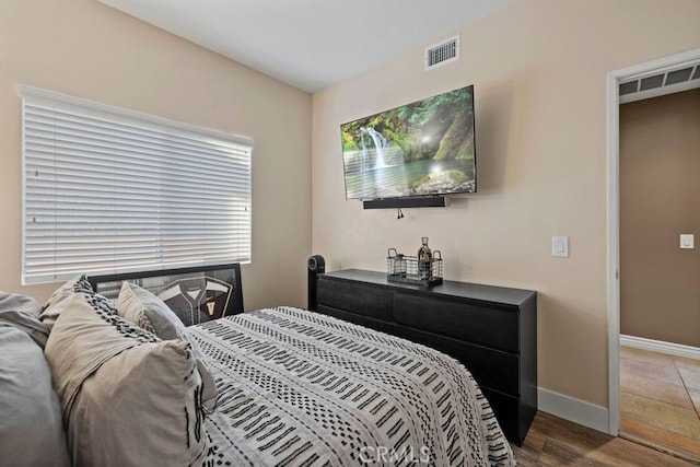 bedroom featuring hardwood / wood-style floors