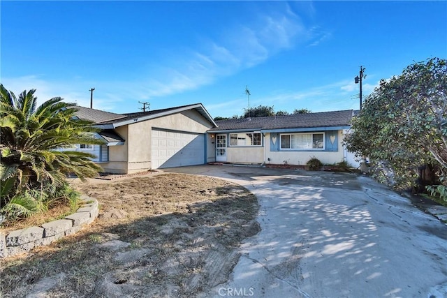 ranch-style home with a garage