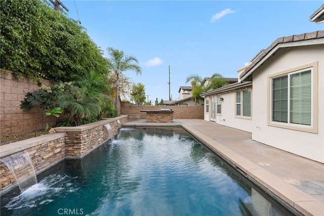 view of swimming pool featuring pool water feature