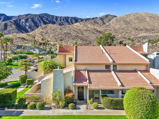 exterior space featuring a mountain view