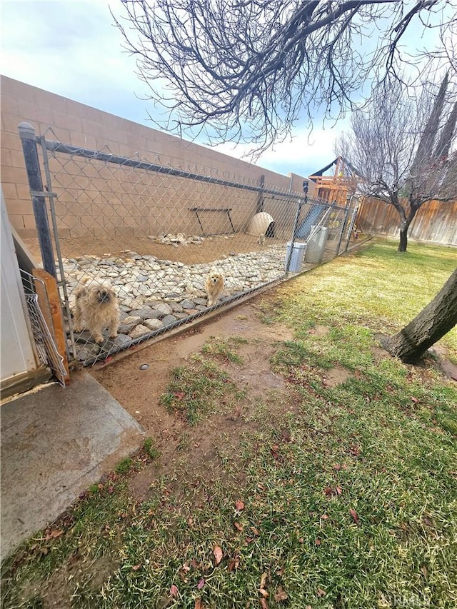 view of yard with fence