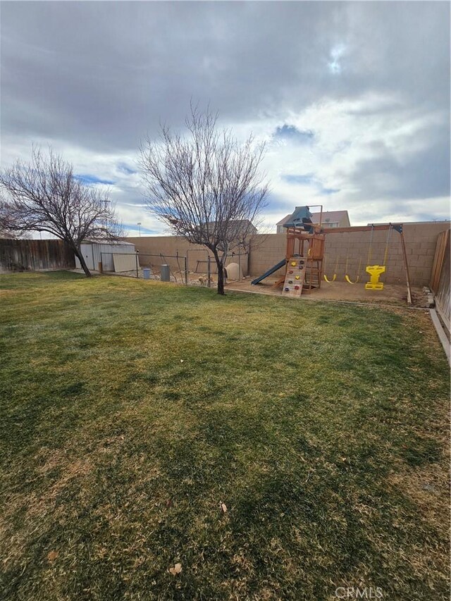 view of yard featuring a playground