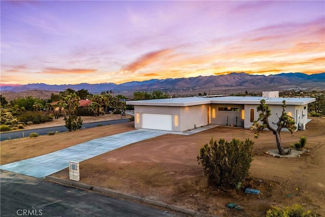 view of front of property with a mountain view