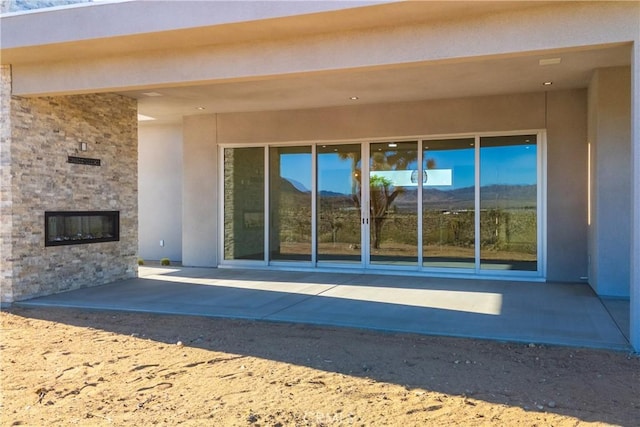 exterior space featuring a fireplace