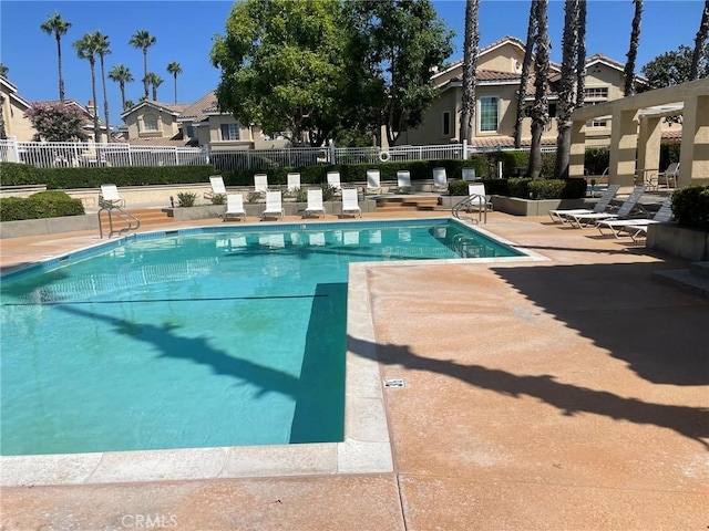 view of pool featuring a patio