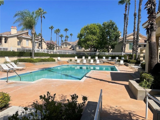 view of pool featuring a patio area