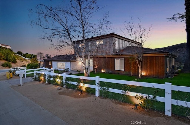 view of front of property with a fenced front yard