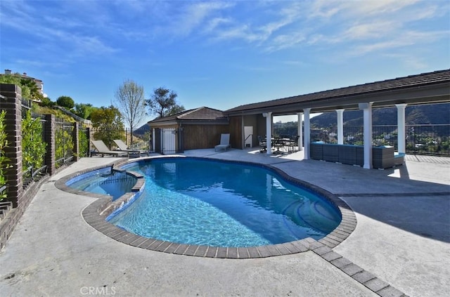 view of pool featuring an outdoor living space and a patio area