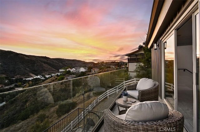 balcony featuring a mountain view