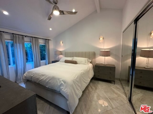 bedroom with ceiling fan and lofted ceiling with beams