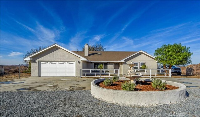 single story home with a garage