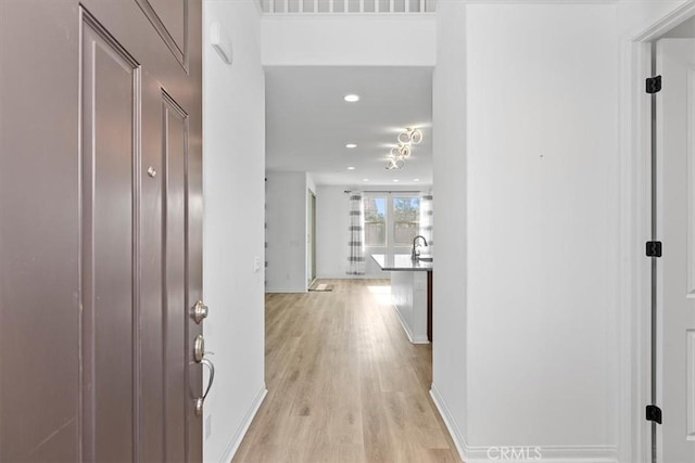 hall featuring light hardwood / wood-style flooring