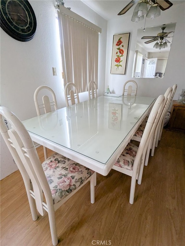 dining room featuring hardwood / wood-style flooring