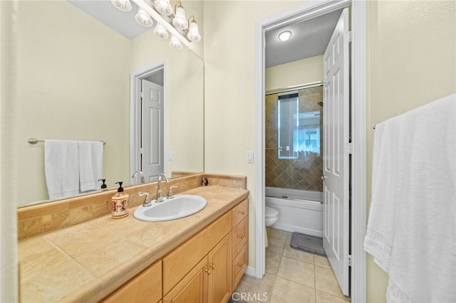 full bathroom featuring bath / shower combo with glass door, tile patterned floors, toilet, and vanity