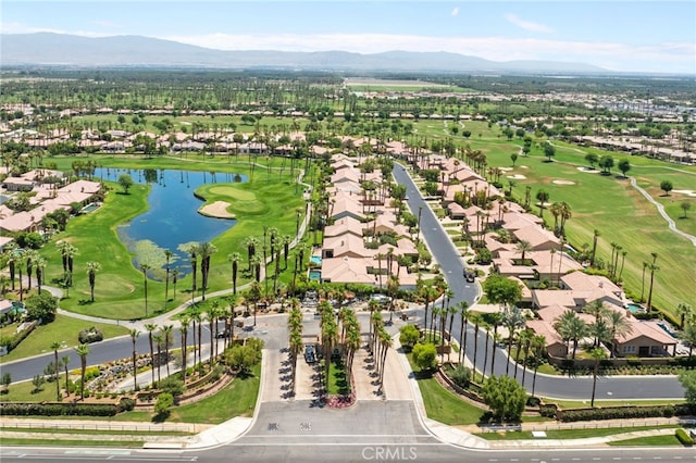 birds eye view of property featuring a water and mountain view