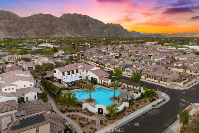 aerial view at dusk with a mountain view