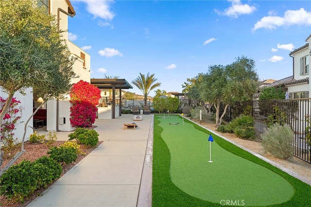 surrounding community featuring a patio area