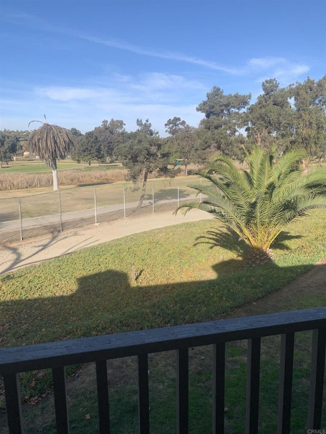 view of yard with a rural view