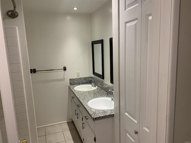 bathroom featuring vanity and tile patterned flooring