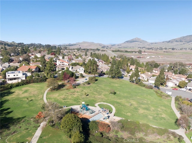 drone / aerial view featuring a mountain view