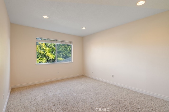 empty room with carpet flooring