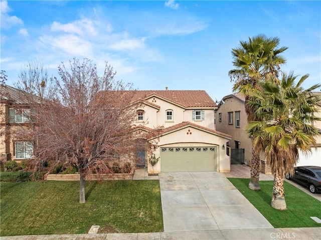 mediterranean / spanish house with a front yard