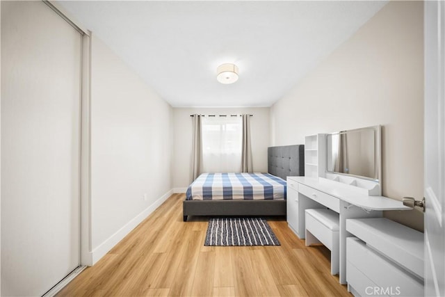 bedroom featuring light wood-type flooring