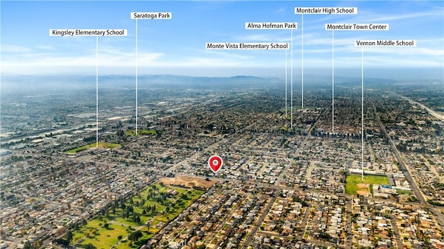 birds eye view of property with a mountain view