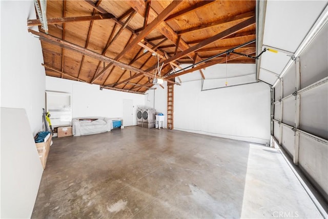 garage featuring washer and dryer