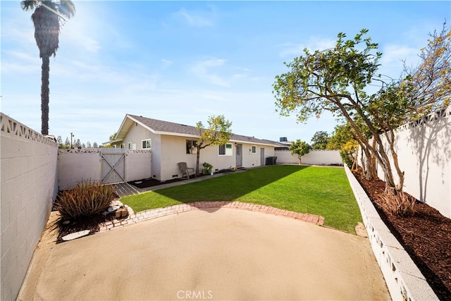 rear view of property featuring a patio area and a lawn