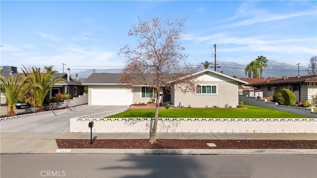 single story home featuring a front lawn and a garage