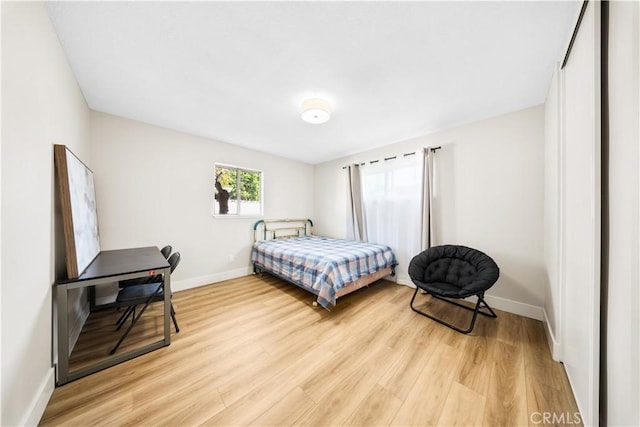 bedroom featuring light hardwood / wood-style flooring