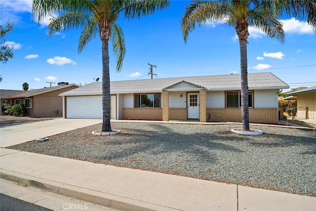 ranch-style home featuring a garage