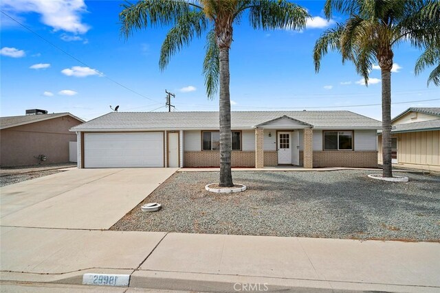 ranch-style home featuring a garage