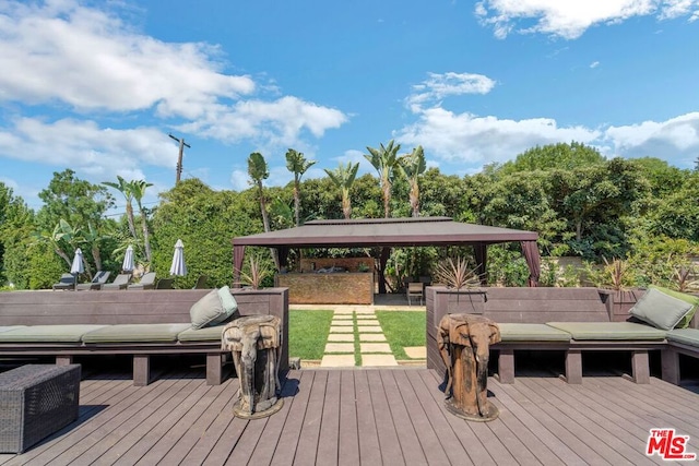 wooden deck with a gazebo