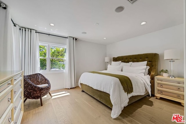 bedroom featuring light hardwood / wood-style flooring