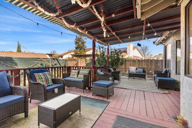 wooden deck with outdoor lounge area