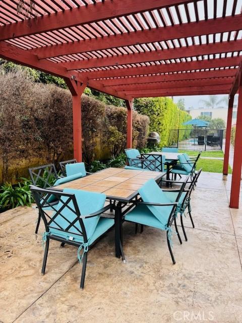 view of patio / terrace featuring a pergola