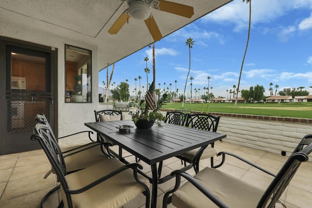 view of patio featuring ceiling fan